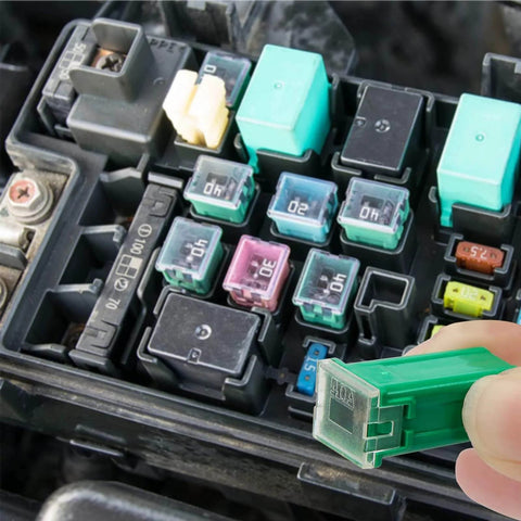 Car Fuse Box Shaped Combo Kit With Tall Standard And Low Profile Fuses For Ford Chevy GM Nissan Toyota Trucks Cars And SUVs In 20A 30A 40A 50A And 60A 30 Piece Set Easy To Organize Durable High Quality shown with hand replacing fuse