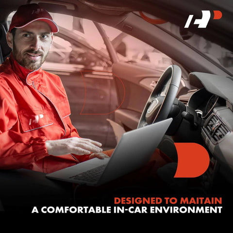 Technician with laptop testing HVAC systems in a car interior, highlighting maintenance for comfortable in-car environment.