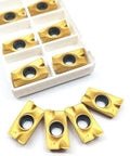 Close-up of 10 APKT1604 carbide inserts from the Pro Grade C20 20 120L Indexable Chamfer End Mill Cutter Set for cast iron processing.