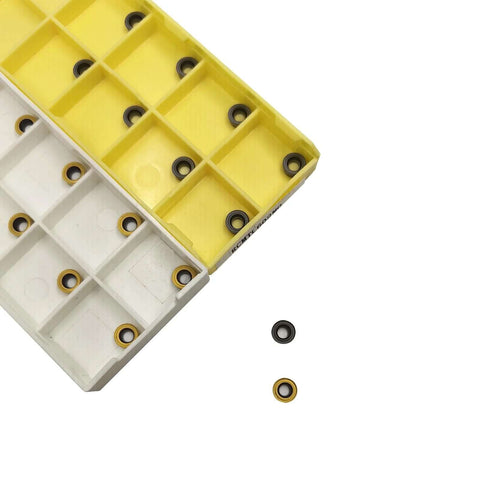 Indexable RCMT0602MO carbide inserts in yellow and white compartment case, part of the Two Piece Lathe Tool Holder Set For Half Inch Lathes