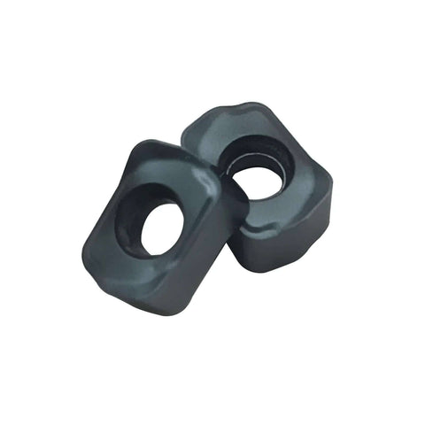 Close-up of two Ten Piece Milling Inserts LNMU020209ZNER ZM1125 Carbide Inserts With PVD Coating For High Speed Roughing And Deep Feed