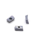 Carbide Milling Inserts For Shoulder Milling P M K Materials Heavy Duty AP Insert visible from different angles on white surface.