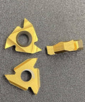 Carbide Threading Inserts 10 Pack 16IR AG55 Gold Coated For SER And SEL Threading Holders, shown on a textured surface