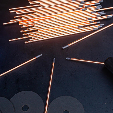 Carbon Arc Gouging Rods Set 10 Pcs 6mm X 305mm Copper Graphite Coated Welding Electrodes on dark surface