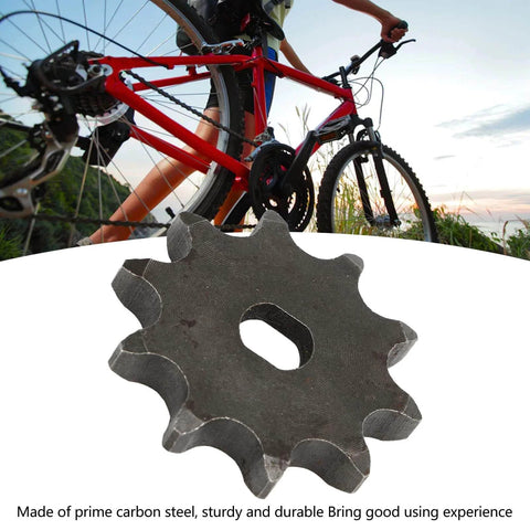 10 Tooth Sprocket Lightweight Carbon Steel Gear For Ordinary Chains next to red bicycle