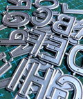 Close-up of 26 Capital Alphabet Dies Set For Metal Cutting, Card Making, Scrapbooking And DIY Embossing Projects, carbon steel letters