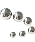 Various sizes of Carbon Steel Bearing Balls on white background, showcasing Precision Balls from 9mm to 20mm, used for high-strength applications.