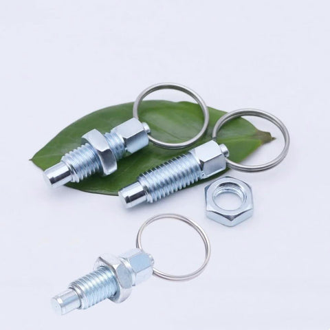 Carbon Steel Pull Ring Indexing Plungers Set Of Six With Retractable Spring Mechanism and Quick Release Pins displayed on leaves