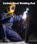 Person welding with E6013 Welding Rods 3 By 32nd Inch, using low carbon steel electrodes, in a workshop setting