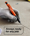 Person using 3-in-1 carpenter pencil on concrete showcasing on-site marking made effortless with built-in sharpener and pocket clip.