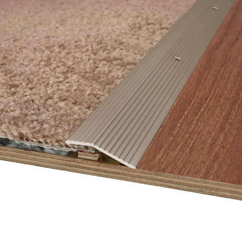 1-3/8 in. X 36 in. Pewter Aluminum Carpet Trim w/Screw Nails installed between carpet and wood floor