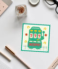 Casino Slot Machine Cutting Dies for Card Making and Scrapbooking with 777 Jackpot theme on white paper background.