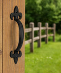 8 Inch Hammered Cast Iron Door Handle Heavy Duty Barn Door Pull For Gates Sheds And Cabinets With Rustic Black Grip installed on wood