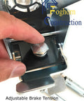Close-up of the brake mechanism on an industrial 6 inch by 2 inch caster set of 4, showcasing adjustable tension feature.