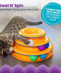 Cat playing with orange track toy and multicolor Replacement Balls for Cat Track Toys, Multiple Colors, 6 Pack, on floor