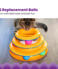 Cat playing with orange tower toy featuring Replacement Balls for Cat Track Toys, Multiple Colors, 6 Pack, on wooden floor.