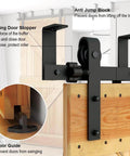 Five Foot Ceiling Mounted Sliding Barn Door Hardware Kit For Wooden Doors with roller bracket, installed on wooden door.
