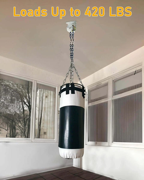 12 Pcs Wall Mount Pulley, 1-1/2" Ceiling Mount Pulley Fit 3/8" Wire Rope, Zinc Plated Removable Small Pulleys for Lifting 420 lbs, installed with a hanging punching bag.