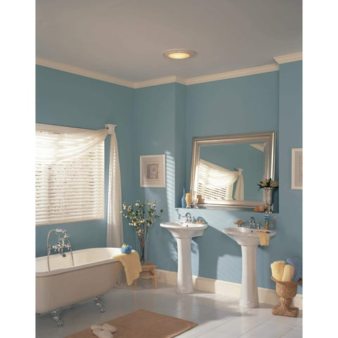 Bathroom with installed Round White Bath Exhaust Fan With Light And Glass Lens, 100 CFM, 3.5 Sones, 4 Inch Duct on ceiling.
