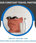 Ceramic Interior 30oz Wine Tumbler With Lid Double Wall Vacuum Insulated For Cold Or Hot Drinks next to an orange bag