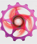 Close-up of a purple Pulley Ceramic Bearing Jockey Pulley Road Bike Bicycle Rear Derailleur Jockey Wheel Bicycle Parts