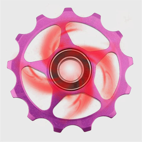 Close-up of a purple Pulley Ceramic Bearing Jockey Pulley Road Bike Bicycle Rear Derailleur Jockey Wheel Bicycle Parts