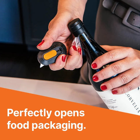 Hands using Mini Ceramic Box Cutter With Retracting Mechanism For Safe Use Zirconium Oxide Blade Lasting About Eleven Times Longer Than Metal Keychain Box Opener Compact Portable Utility Knife For Packages Letters And Gift Wrapping to open food packaging