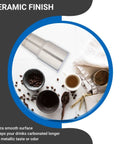 Ceramic Interior 30oz Wine Tumbler With Lid Double Wall Vacuum Insulated shown with coffee and accessories