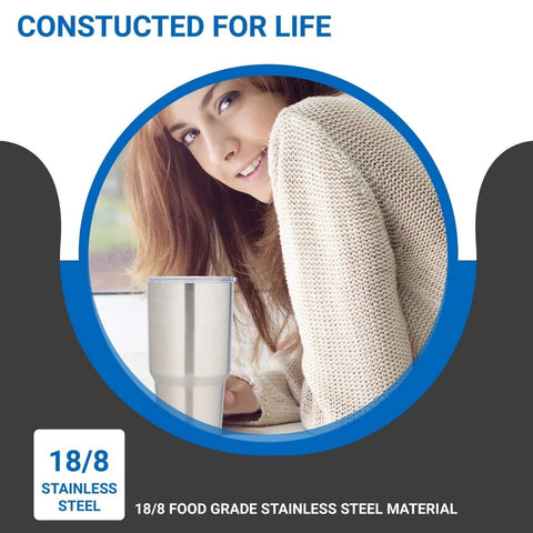 Woman holding Ceramic Interior 30oz Wine Tumbler With Lid Double Wall Vacuum Insulated For Cold Or Hot Drinks in a cozy setting.