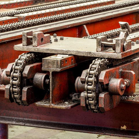 Two 10 Tooth Chain Sprockets With One Quarter Inch Pitch And 8 Millimeter Bore For ISO 04C Chains in a machinery setup
