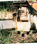 Chainsaw with anti vibration rubber mounts for 52 to 58cc gasoline models in grassy area, enhancing smoother, quieter operation