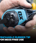 Close-up of 50ft Precision Chalk Line Tool Value Pack with Kevlar Ultra Fine Line, 3:1 Gear being held, showing pinchable rubber tip.