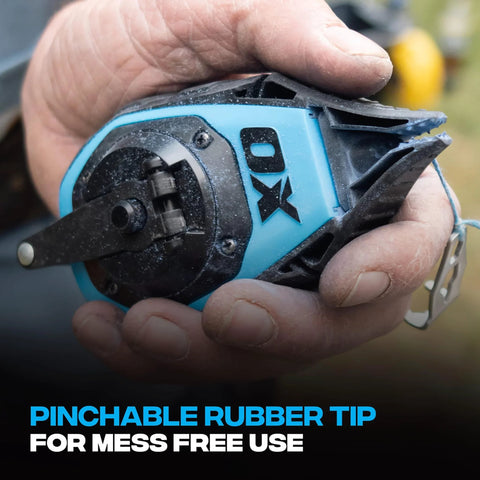 Close-up of 50ft Precision Chalk Line Tool Value Pack with Kevlar Ultra Fine Line, 3:1 Gear being held, showing pinchable rubber tip.