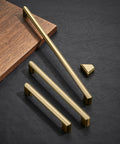 Ten Pack Champagne Bronze Cabinet Handles Five Inch Length 128mm Screw Spacing Zinc Alloy Durable Furniture Hardware on black surface