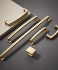 Champagne Bronze 10 Pack Cabinet Knobs Single Hole Drawer Pulls for Kitchen and Bedroom Cabinets displayed on a flat surface.