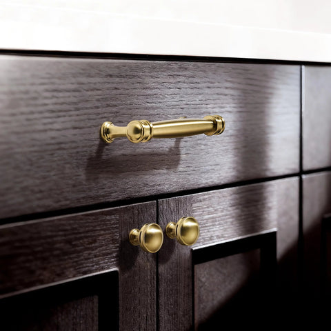 Champagne Bronze Cabinet Knobs Set of Ten, One and One Quarter Inch Round Zinc Alloy Drawer Knobs on dark wood cabinets