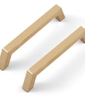 Two modern square gold cabinet pulls from the 30 Pack 5 Inch Champagne Bronze Cabinet Handles with 128 Millimeter Hole Centers.