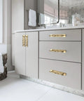 Champagne Bronze Cabinet Pulls With Backplates Modern Zinc Alloy Drawer Handles for Kitchen and Bedroom installed on gray cabinets.