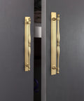 Champagne Bronze Cabinet Pulls With Backplates 7.56 Inch Center to Center Spacing on dark cabinet doors