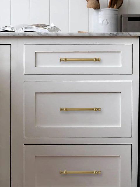 Champagne Bronze Cabinet Pulls In 5 Inch Hole Center For Cupboard And Drawer 10 Pack Solid Zinc Alloy installed on white drawers