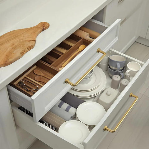 Set Of 6 5 Inch Center To Center SleekTouch Champagne Bronze Cabinet Pulls installed on kitchen drawers