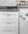 10 Pack 3 Inch Champagne Bronze Cup Drawer Pulls for cabinets and furniture installed on modern kitchen cabinets