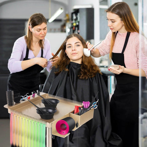 Champagne Gold Pro Grade Hair Salon Cart with wheels in use at a salon, holding various tools, showing its multi-functionality.