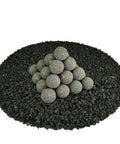Charcoal Gray 2 inch Ceramic Fire Balls - 30-Pack - Brushed Concrete Look, Speckled, stacked on black gravel surface