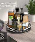12 Inch Round Black And White Checkered Lazy Susan Turntable With Iron Frame on a kitchen counter with condiments and jars.