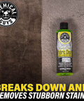 Chemical Guys Foaming Citrus Fabric Clean, Carpet and Upholstery Cleaner bottle on stained fabric background, 16 oz.