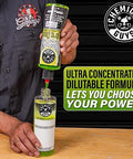 Person pouring Chemical Guys Foaming Citrus Fabric Clean into a secondary bottle, focused on its ultra concentrated formula.