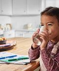 Child drinking water in kitchen with PureSource Ultra Water Filter ULTRAWF Replacement For Refrigerator Delivers Fresh Clean Tasting Water