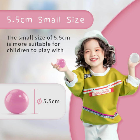 Child holding small ball pit balls, smiling. Balls for Ball Pit Pack of 50 - BPA Free, Crush Proof Plastic Balls, 2.15 Inch Diameter.