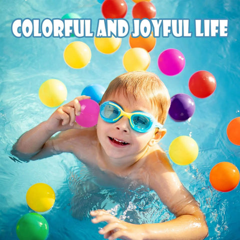Child swimming in a pool with BPA Free 100 Pack Colorful Plastic Balls for Baby Play & Ball Pit, Tent, Pool, House.